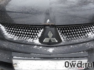 Битый автомобиль Mitsubishi Lancer