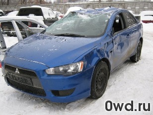 Битый автомобиль Mitsubishi Lancer