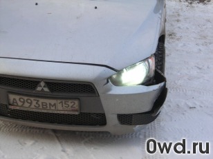 Битый автомобиль Mitsubishi Lancer