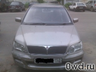 Битый автомобиль Mitsubishi Lancer Cedia