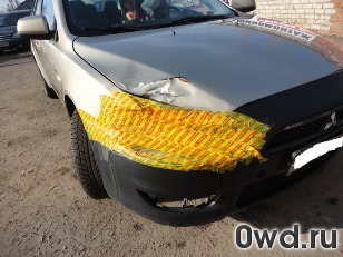 Битый автомобиль Mitsubishi Lancer